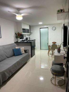 Apartamento moderno e super confortável localizado a alguns passos da Praia Grande